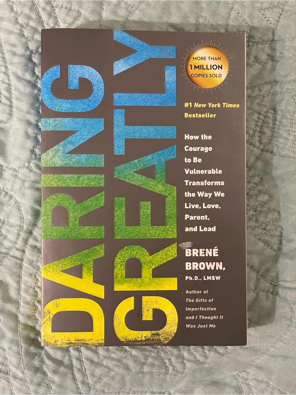 Avery Brown Cover with Blue, Green, Yellow Lettering